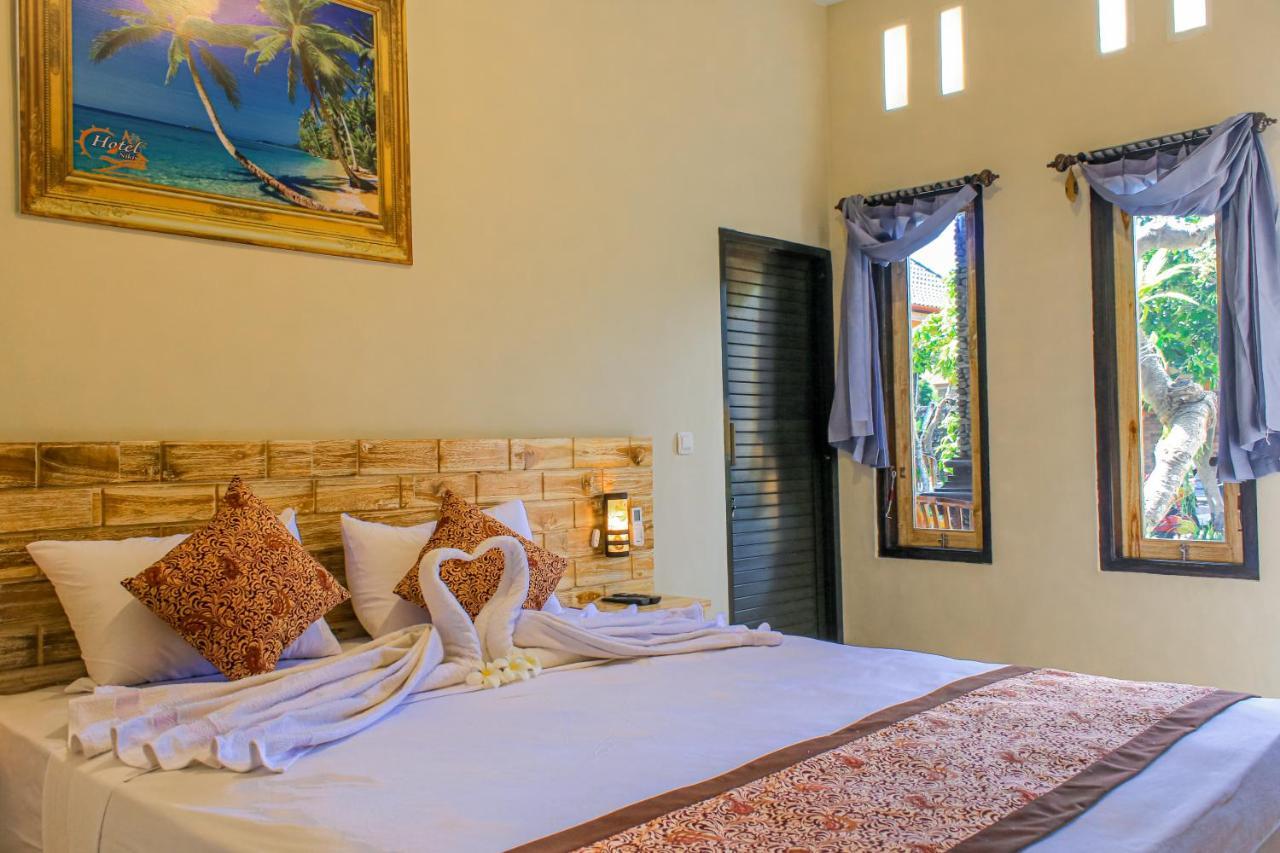 Hotel Niki Jembrana Extérieur photo